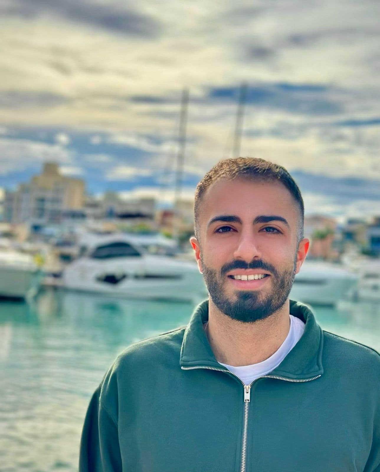 Charalampos Panagiotou, freelance web developer, smiling at the camera